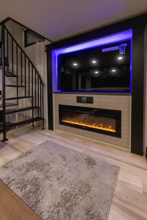 Rear entertainment area with stairs leading to rear loft