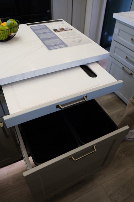 Residential-inspired cutting board over trash can