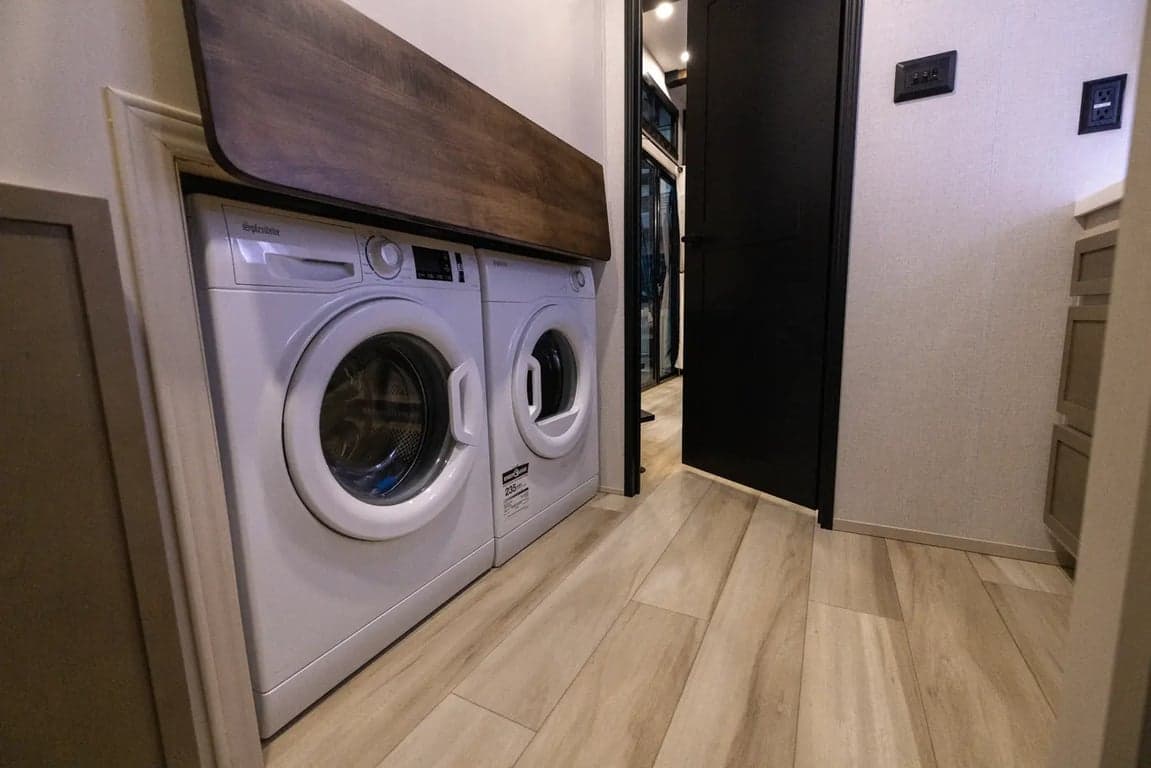 Washer/dryer and laundry area in full bath