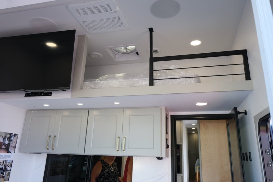 Loft in garage, accessible by telescoping ladder