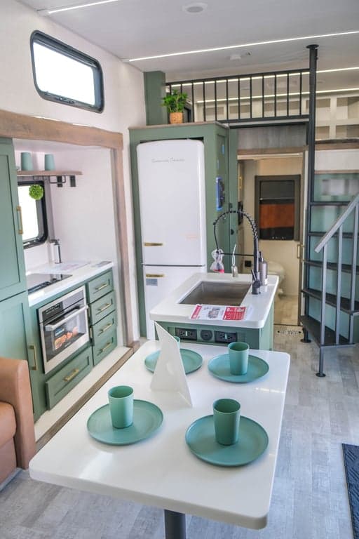 Facing forward toward kitchen from living area