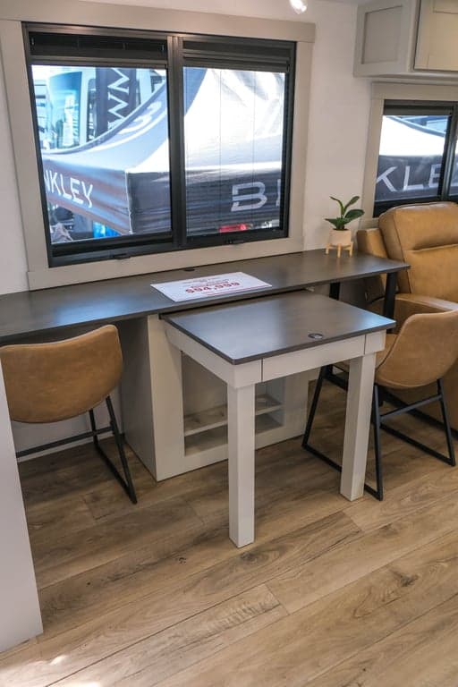 Adjustable dinette/desk