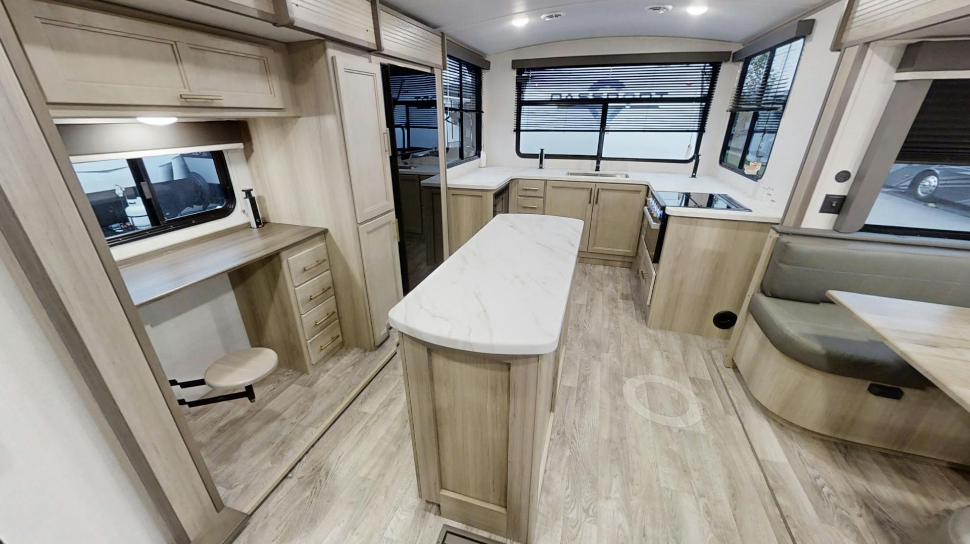 Rear kitchen and desk in the Outback Ultra Lite 296URK